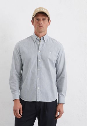 Striped button-up shirt in light blue and white, cotton blend fabric, fitted design, with a classic collar and long sleeves.