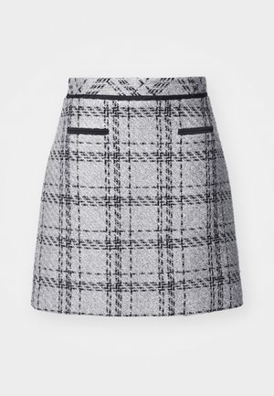 Gray plaid skirt featuring a textured fabric, slim fit, and black trim. Includes two front pockets with black detailing.