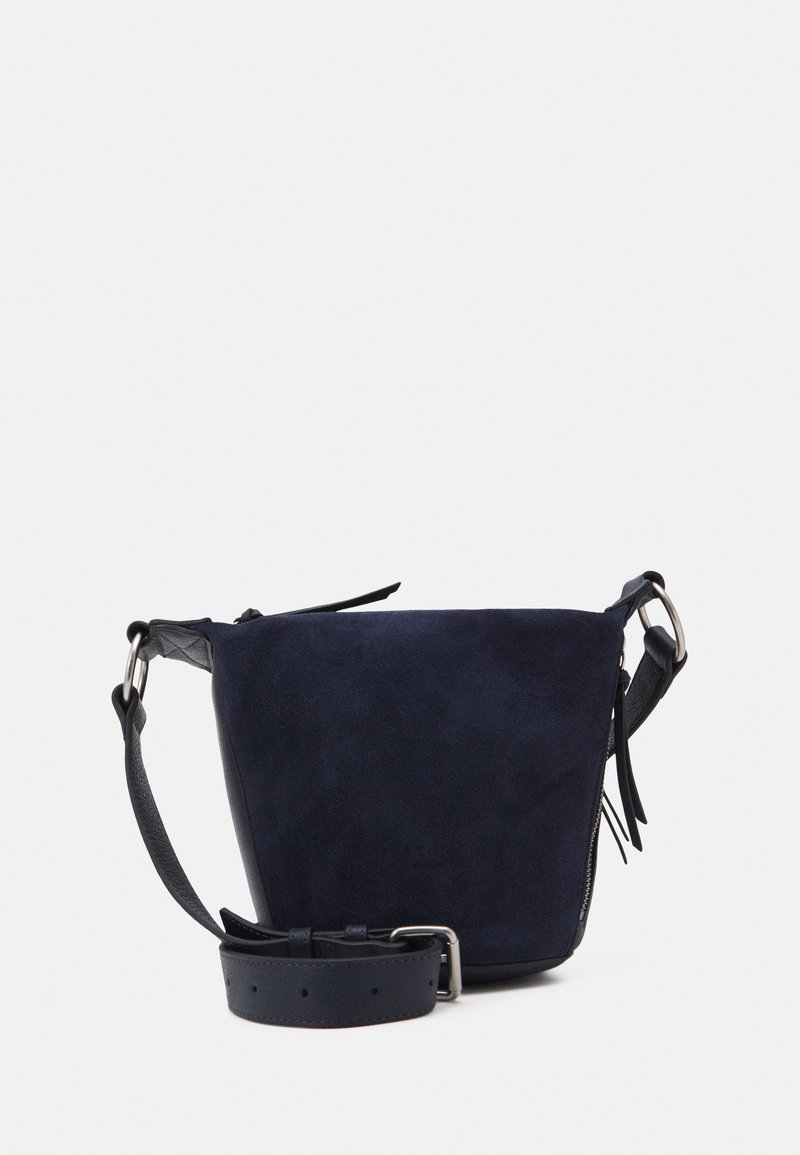 Navy suede crossbody bag with a soft texture, featuring a flat base, adjustable leather strap, and metal hardware accents.