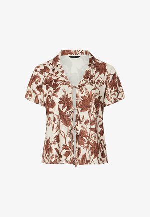 Bluzka z krótkim rękawem z guziczkami, zdobiona kwiatowym wzorem w odcieniu rdzy na kremowym tle, z wiązanym przodem i prążkowaną fakturą.