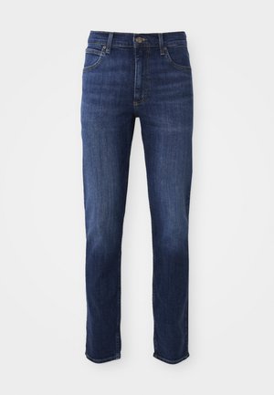 Donkerblauwe denim jeans met een rechte pasvorm, voorzien van een klassieke vijf-pocketontwerp en metalen knoopsluiting. Subtiele vervaging details op de stof.