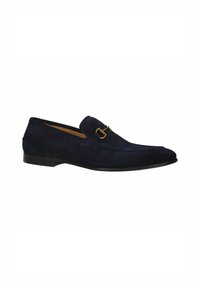 Navy suede loafers with a textured finish, featuring a gold-tone hardware accent on the upper and a slim black rubber sole.