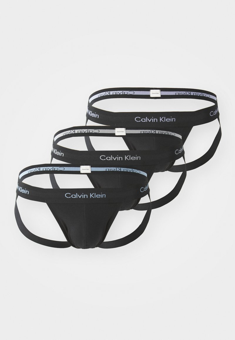 Schwarze Baumwollunterwäsche mit elastischem Calvin Klein Bund, mit einem Logo in kontrastierendem Hellblau. Drei Paare ausgestellt.