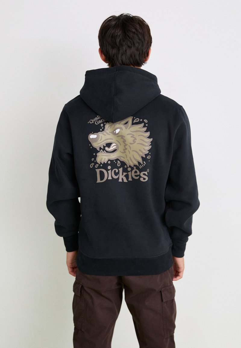 Black hoodie with graphic of a wolf on the back and "Dickies" logo, features a drawstring hood, ribbed cuffs, and hem.