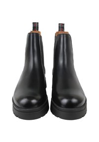 Stivaletti neri in pelle con finitura liscia, pannelli laterali elasticizzati e un leggero tacco; con linguette a contrasto sul retro.