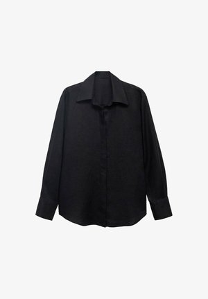 Black long-sleeve shirt made of textured fabric with a pointed collar, button front, and loose fit. Cuffs are tailored with a single button.