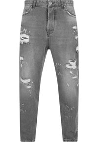 Jeans gris desgastados con rasgaduras deshilachadas y detalles de salpicaduras ligeras. Disponibles en un corte recto con diseño clásico de cinco bolsillos.
