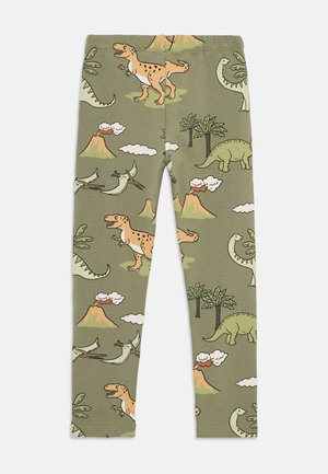 Legginsy w zielono-oliwkowy wzór dinozaurów wykonane z bawełny. Wzór zawiera T. rexa, wulkany, rośliny oraz różne dinozaury w stylu kreskówkowym.