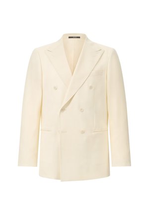 Kremowa, dwurzędowa marynarka z szpiczastymi klapami, sześcioma guzikami, dwiema przednimi kieszeniami i kieszenią na piersi, na białym tle.