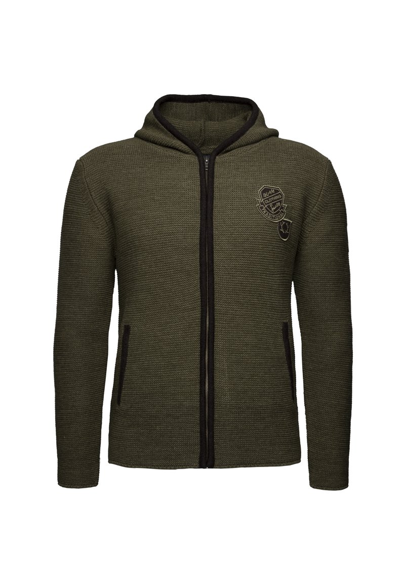 Sweat à capuche zippé en vert olive, en tissu texturé avec fermeture éclair noire et poches. Il présente un logo brodé sur la poitrine.