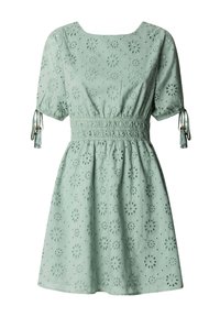 Lichtgroene jurk met korte mouwen en een bloemrijk ajourpatroon, elastische tailleband, vierkante halslijn en strikdetails met kwastjes aan de mouwen.