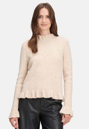 - Sweter