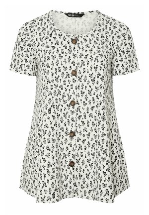 Blouse blanche à manches courtes avec imprimé floral noir, encolure ronde et six boutons marron sur le devant.