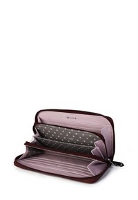 Burgundy leather wallet with a pink interior. Features multiple card slots, zippered compartments, and a polka dot pattern inside.