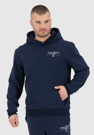 Felpa blu navy realizzata in morbido tessuto, con tasca frontale, polsini a coste e dettaglio del logo bianco sul petto. Design di taglio classico.