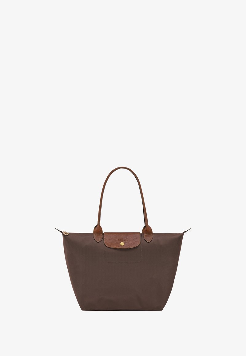 Large brown tote bag with long leather handles and a leather flap with a gold button closure at the top center.