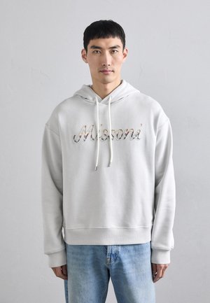Light grey hoodie with a relaxed fit; features embroidered "Missoni" in multicolor. Soft fabric with a drawstring hood and ribbed cuffs.