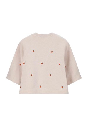 Beige cropped t-shirt made of soft fabric, featuring scattered red and green fruit-like motifs, with short sleeves and a round neckline.