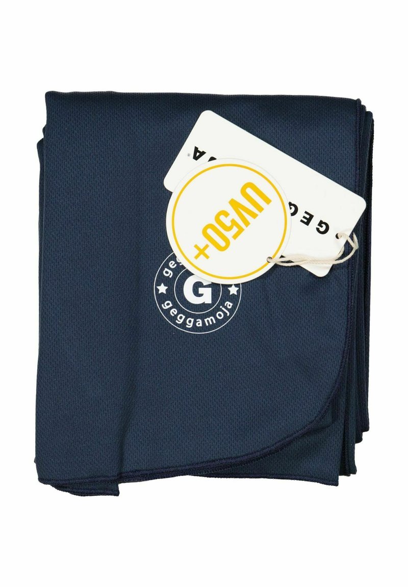 Navy blue towel made of textured fabric, featuring a round logo with the letter "G." Tags are attached, displaying black and yellow details.