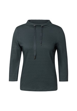 Pullover vert foncé avec un col haut, des manches trois-quarts, un motif texturé et des cordons réglables avec des embouts en métal.