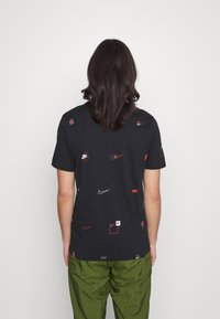 Nike Sportswear LOGO TEE - T-shirt estampada - black