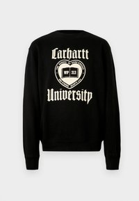 Czarna bluza z białym napisem "Carhartt University" i emblematem w kształcie otwartej książki, co sugeruje luźny styl.