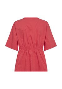 Blusa coral a vestibilità ampia, con maniche corte, arricciatura elastica in vita e una consistenza morbida e liscia. Design semplice senza ulteriori pattern.