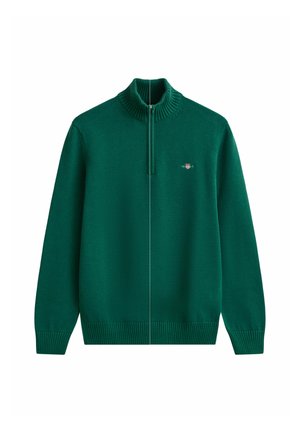 Groene zip-up trui met een geribbeld kraag en mouwen; gemaakt van een glad gebreid materiaal; heeft een klein logo accent op de borst.