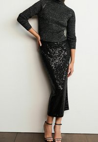 Next Sweter