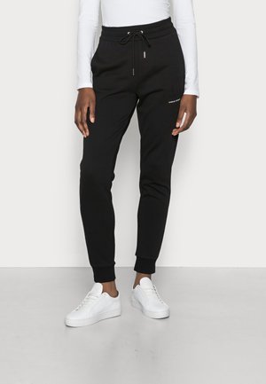 TROUSER ICON - Teplákové kalhoty - black