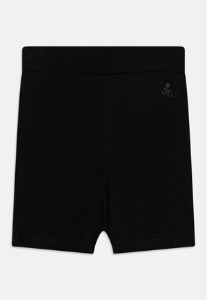 Schwarze eng anliegende Shorts mit einem breiten elastischen Bund und einem kleinen bestickten Logo auf der oberen rechten Seite.