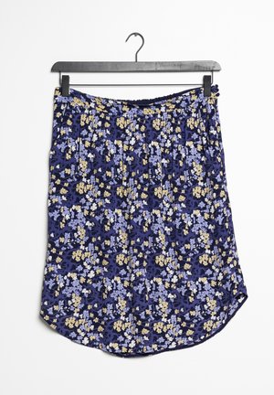 Jupe florale avec un fond marine, présentant des motifs de fleurs bleues et jaunes, design plissé et taille élastique.