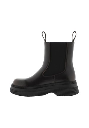 Botas Chelsea de goma negra con paneles laterales elásticos, suela texturizada y gruesa, y asas en la parte trasera para facilitar su uso.