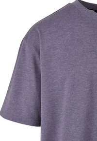 Gray short-sleeve t-shirt, made of soft, textured fabric with a crew neck, featuring a relaxed fit and no visible patterns or accents.