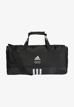 Bolsa de deporte negra con asas dobles, bolsillo lateral de malla, forma rectangular y acentos de rayas blancas. Presenta un parche con el logo de Adidas.