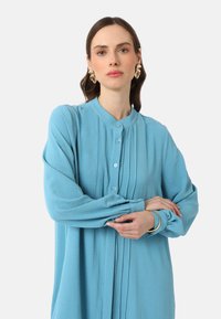 Modanisa Paitapusero - turquoise