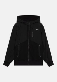 Svart hettejakke med glidelås foran, laget av en blanding av myk fleece og glatt stoff, med et lite logo og sidelommer.