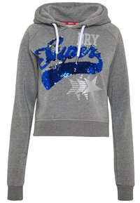 Cropped gray hoodie with sparkly texture, featuring blue sequined "Super" design, silver star graphic, and adjustable white drawstrings.