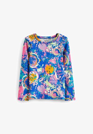 Camiseta de manga larga de canalé para niños con patrones abstractos vibrantes en azul, rosa, amarillo y púrpura de flores y corazones.