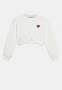 Sudadera blanca corta con mangas largas, pu�ños acanalados y un corazón rojo bordado en el pecho. Material de algodón suave.