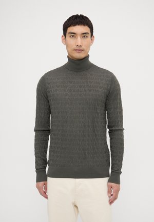 Maglione dolcevita verde scuro con motivo logo Emporio Armani tono su tono, polsini a coste e vestibilità rilassata.