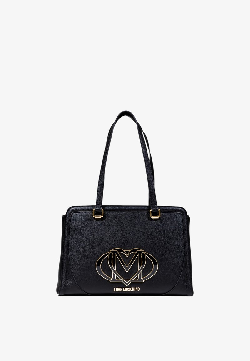 Sac à main en faux cuir noir avec des détails en logo doré. Il possède deux solides poignées et un design structuré avec une texture lisse.