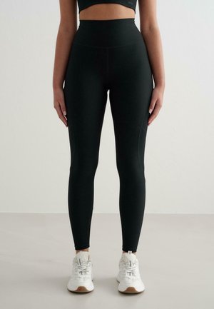 PERFORMANCE POCKET - Leggings - black
