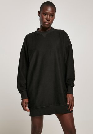 Stickad klänning - black
