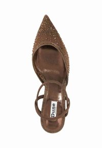 Brown strappy high-heeled shoe with a pointed toe, adorned with small decorative studs, featuring a shiny inner lining and branded insole.