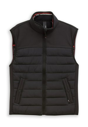 Gilet imbottito nero senza maniche con collo alto, zip frontale e due tasche laterali con bottone, progettato per il calore e l'uso all'aperto.