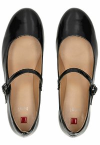 Scarpe Mary Jane in pelle verniciata nera con punta arrotondata, tacco basso e cinturino regolabile, con un piccolo accento rosso sulla soletta.