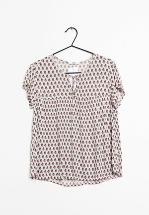 Short-sleeve blouse with a round neckline, featuring a floral pattern in shades of pink and green on a light background, tie detail at the front.