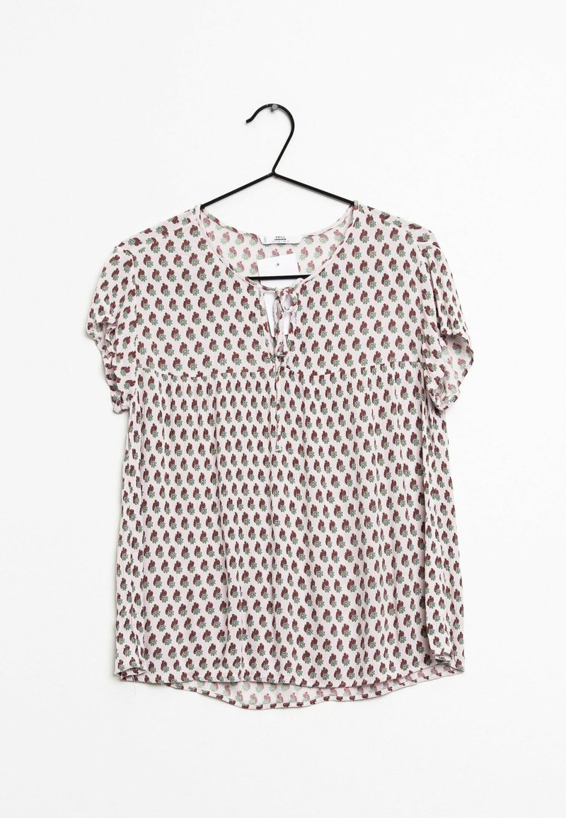 Lyhythihainen paita pyöreällä kaula-aukolla, jossa on kukkakuosi pinkin ja vihreän sävyissä vaalealla taustalla, etuosassa solmuseikka.