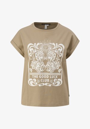 Beige puuvillane T-särk lühikeste varrukatega; sellel on valge graafika tiigritest, rikkalikke mustreid ja tekst "HEAD ÕNNET".